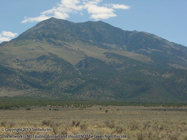 Beautiful Pilot Peak by Montello and Wendover Nevada in September 2003! At 10,716 feet she is the highest point in the Pilot Mountain Range and can be seen for miles across the valley! My Grandfather always told me I was related to the great American explorer Kit Carson and I read that Pilot Peak got its name from an expedition he was on! I just found an even greater reason to love it! Another place he explored before me! Char the Explorer : )